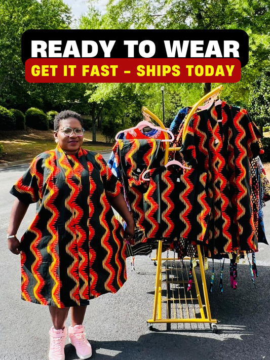 Woman wearing a three-piece Ankara ensemble featuring a fitted top, wide-leg pants, and a flowing kimono-style jacket, standing outdoors.
